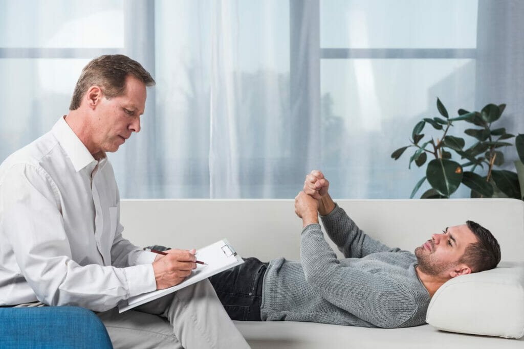 male doctor talking with male patient