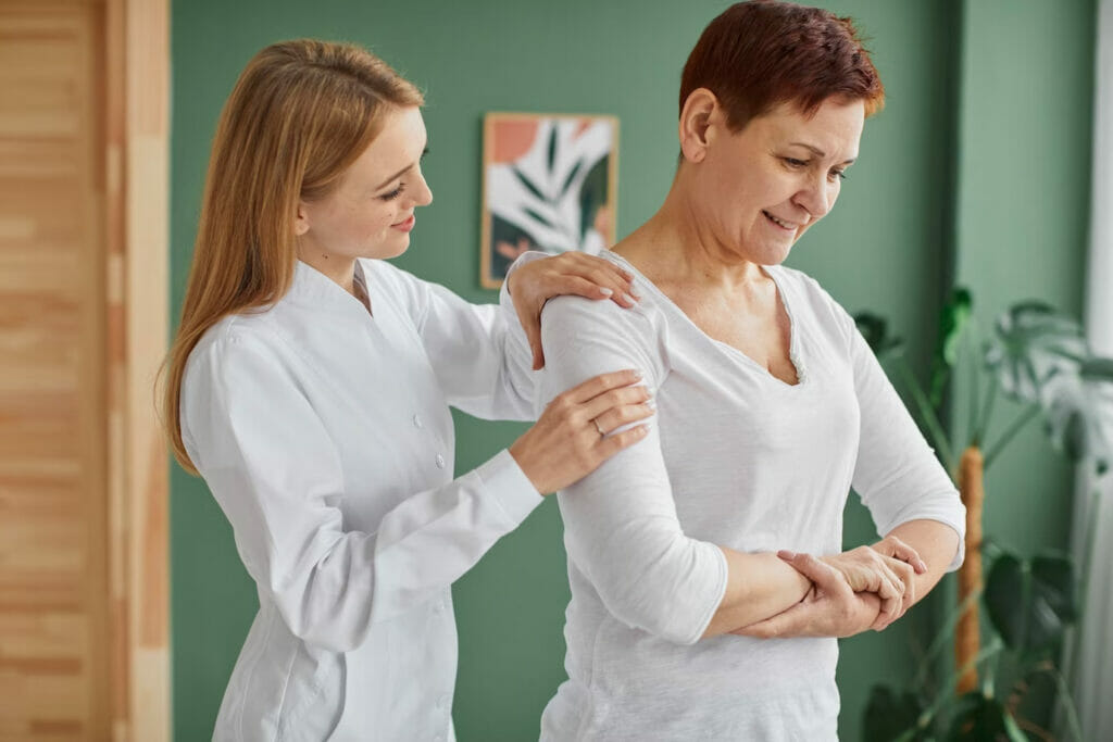 female chiropractor giving a woman a massage