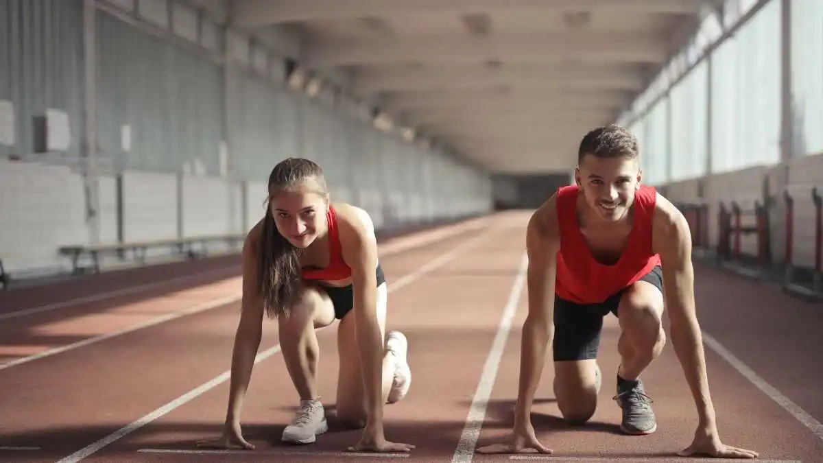 two women running