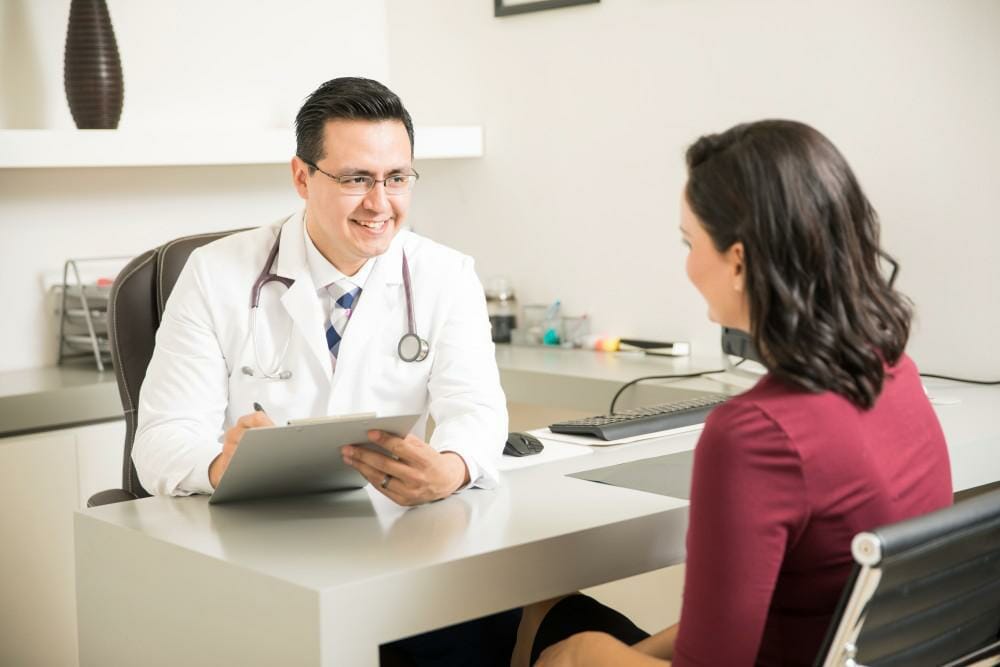 doctor talking with patient