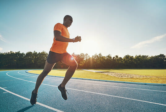 man running on track