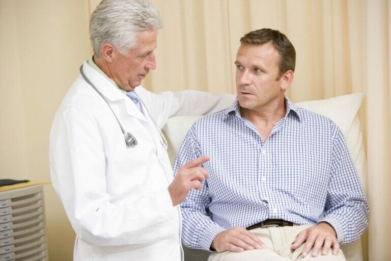 male doctor talking with male patient