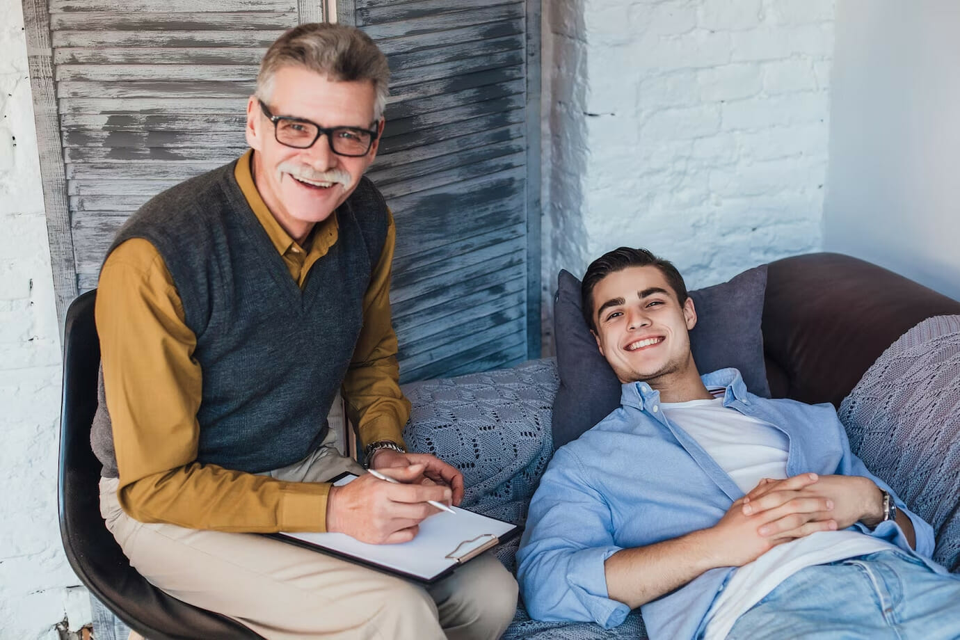 male doctor talking with male patient