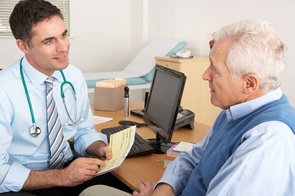 male doctor talking with male patient